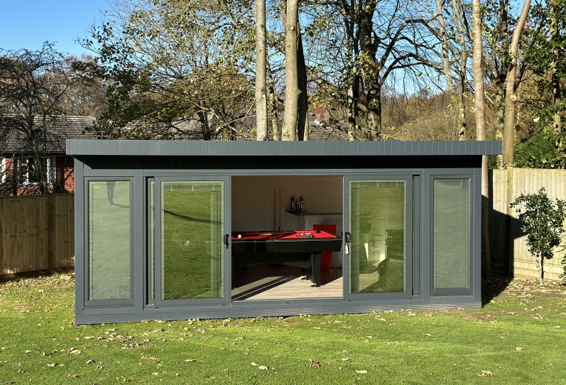 bespoke, inline slider garden game room with integrated blinds and bar Kent