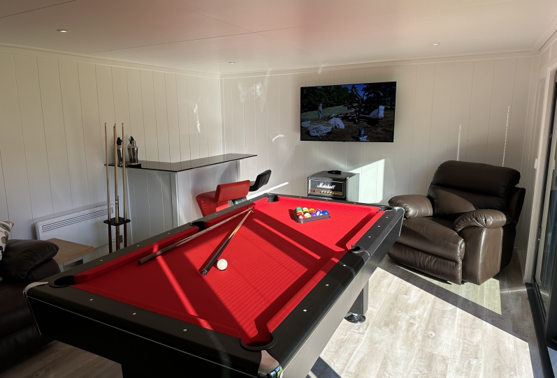 bespoke, inline slider game room with pool table and bar in Kent