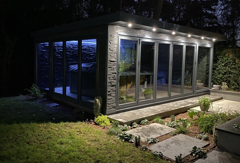 double bi-fold, split face tile clad,  hot tub room in hampshire