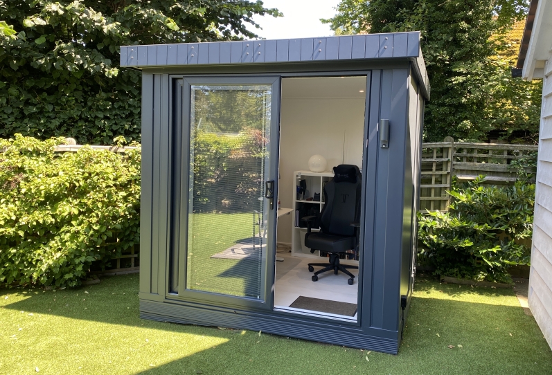 compact garden office with sliding door in Sussex