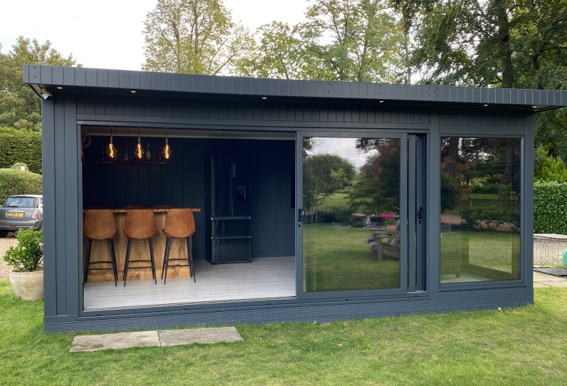 Tri-sliding entertainment , reflective LowE anti sun glass and bar in Surrey