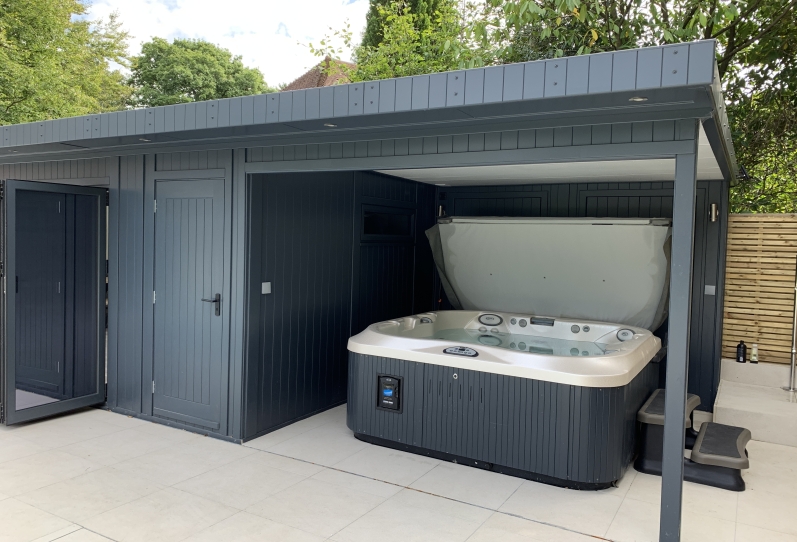 hot tub canopy with cupboard, toilet and bi-fold doors  Kingswood Surrey