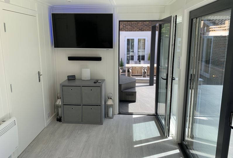 Aluminium in-line slider with canopy and hot tub featuring 'Starlight Ceiling' West Sussex Internal
