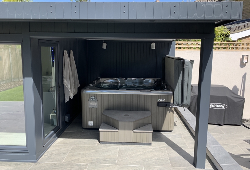 Aluminium in-line slider with canopy and hot tub featuring 'Starlight Ceiling' West Sussex Hot Tub