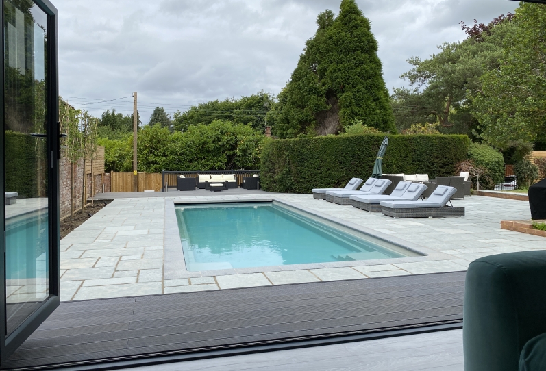 Poolside Room with Bi-folding Doors, Shower Room, Stone Cladding and Fitted Kitchen. West Sussex