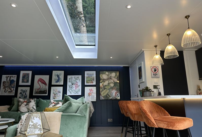 Garden room interior design based on the Ivy with a roof light in London