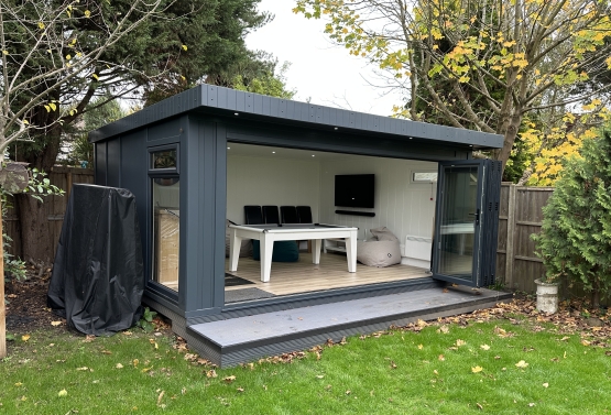 bi-fold game room with pool table and front decking in London