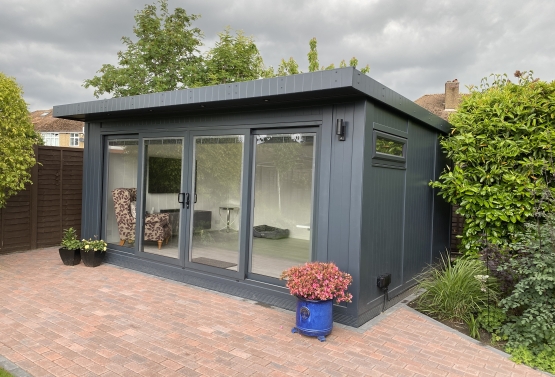 inline sliding door summer house with integrated blinds in Kent